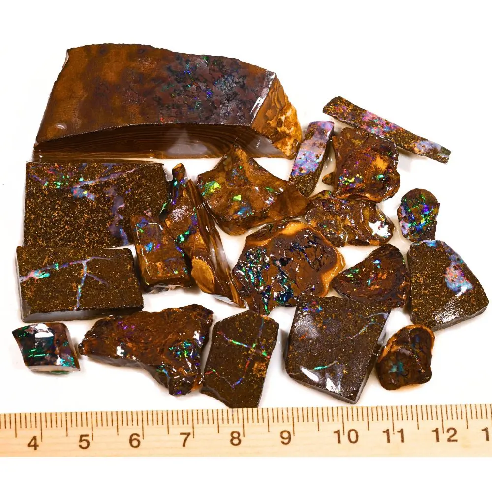84g rainbow boulder opal matrix rubs parcel from Winton, Australia showing dense multicolor pinfire scattered through natural dark ironstone matrix. 100% natural and untreated.