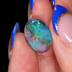 lightning-ridge-black-opal-green-orange-fire-oval-cabochon-opal-galaxy