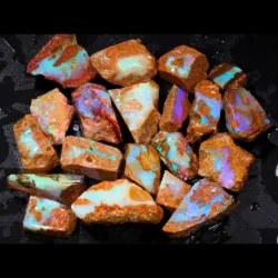 374ct crystal boulder opal rubs rough parcel of 20 pieces from Winton, Australia with pastel blue, green, purple, and red crystal opal in natural sandstone matrix. Natural, untreated.
