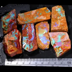 861ct crystal boulder opal rubs parcel from Winton, Australia showing translucent blue and purple crystal fire across large polished faces. 100% natural and untreated.