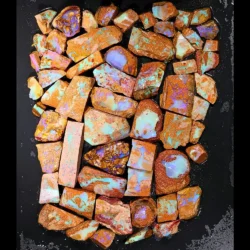 613g crystal boulder opal rubs wholesale parcel of 59 pieces from Winton, Australia with purple, blue, green, and pink pipe crystal fire. Natural, untreated.