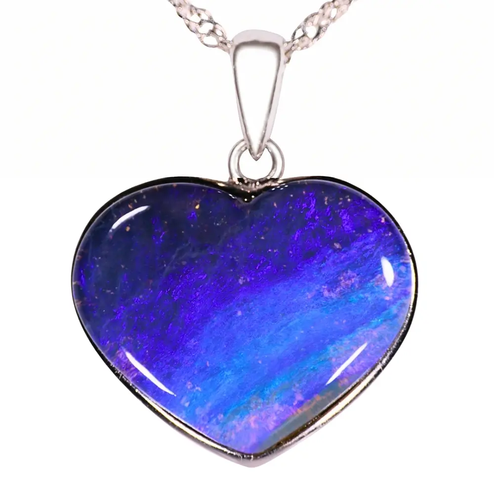 Close view of 26 ct purple and blue heart shaped Australian boulder opal pendant set in rhodium plated S925 sterling silver