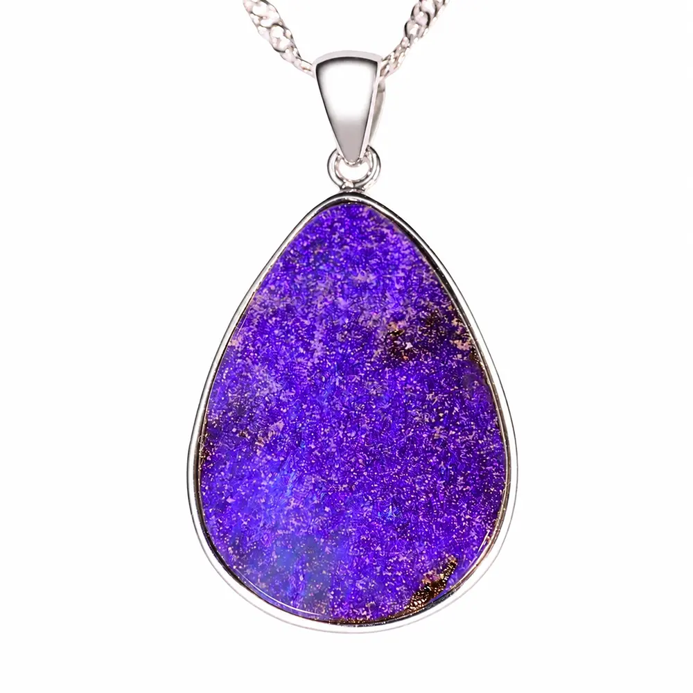 Close view of 27 ct purple teardrop boulder opal pendant from Winton Australia in a sterling silver setting
