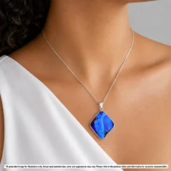 Ocean blue boulder opal pendant shown worn on a silver chain for illustrative styling reference