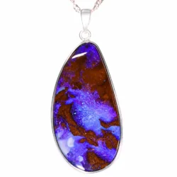 Close view of 35.5 ct purple boulder opal pendant with natural brown ironstone matrix in sterling silver