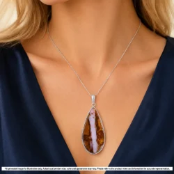 Pink and orange Australian wood fossil boulder opal pendant shown worn on a silver chain for illustrative styling reference