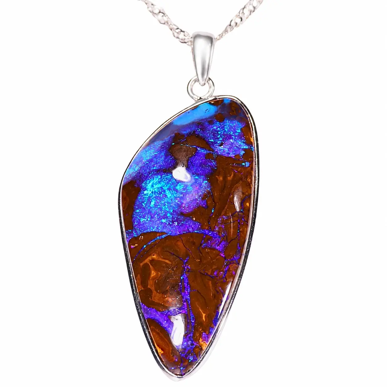 Close view of 49 ct freeform boulder opal pendant showing vivid purple blue fire and natural brown ironstone matrix