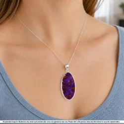 Natural Australian purple boulder opal pendant shown worn on a silver chain with contrasting ironstone matrix