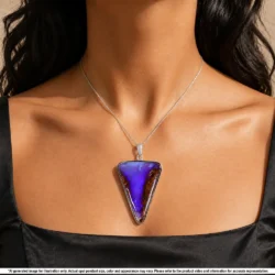 Purple Australian boulder opal pendant shown worn on a silver chain with natural matrix and sterling silver setting