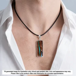 Hand carved Winton boulder opal pendant shown worn on a black necklace with green opal seam, brown ironstone matrix and silver setting