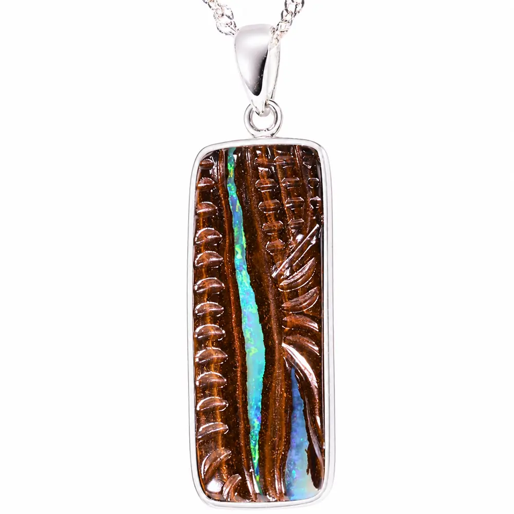 26.4 ct hand carved boulder opal pendant from Winton Australia with green yellow opal seam in natural brown matrix and sterling silver setting