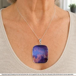 Natural Australian purple picture boulder opal pendant with ironstone matrix shown worn on a silver chain