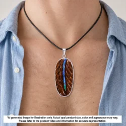 4.4 ct Winton boulder opal pendant shown worn on a black necklace with blue green opal seam and tribal carved ironstone matrix