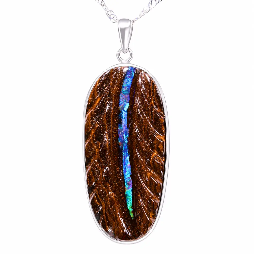 44.4 ct tribal hand carved boulder opal pendant from Winton Australia with blue green opal seam in natural brown ironstone matrix