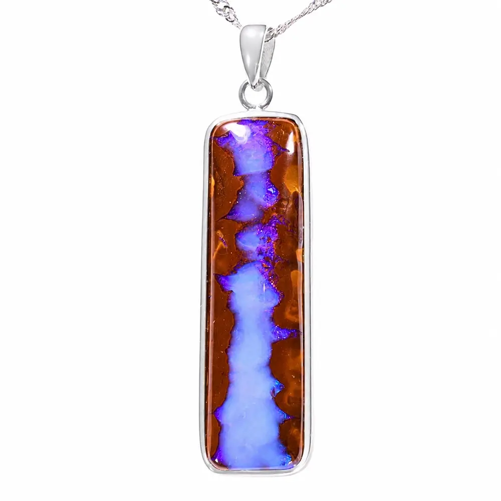33.5 ct blue and purple boulder opal pendant from Winton Australia with wood fossil matrix and sterling silver setting