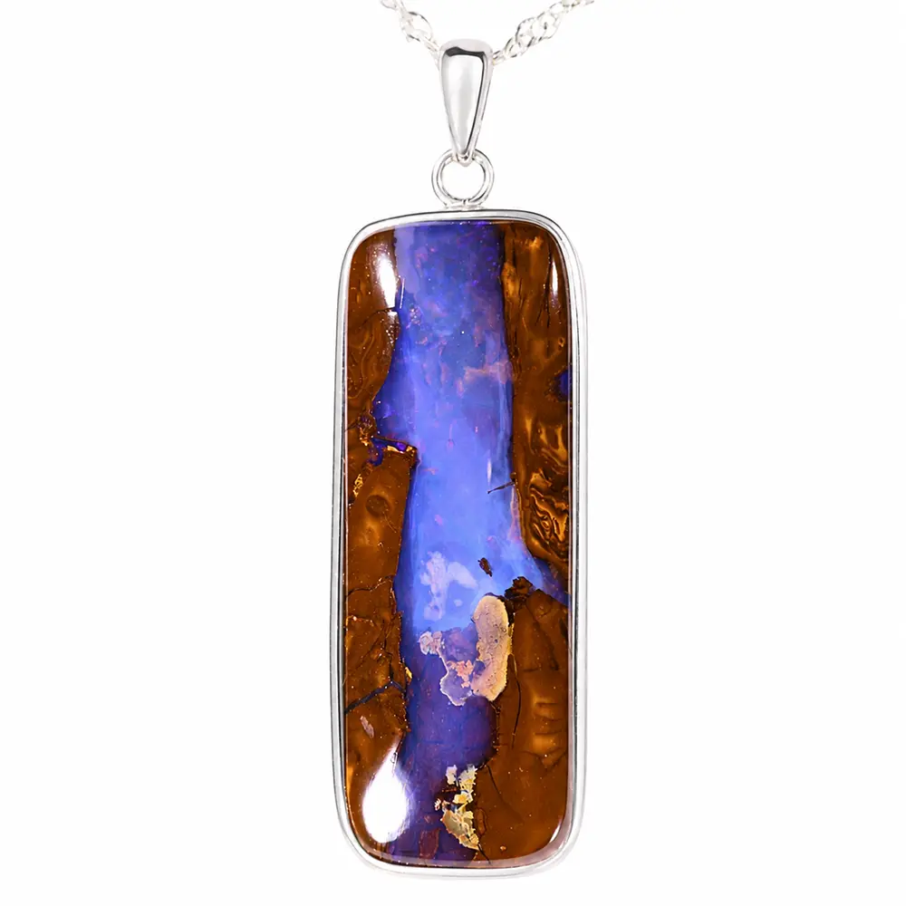 49.5 ct purple boulder opal wood fossil pendant from Winton Australia set in rhodium plated S925 sterling silver