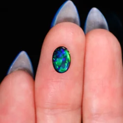 golden-yellow-green-fire-black-opal-0-65ct-opal-galaxy