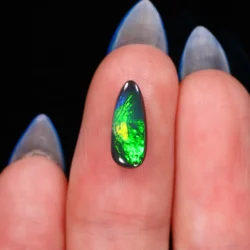 jet-black-opal-gemstone-finger-display-1-06ct-opal-galaxy