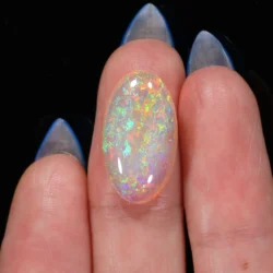 large-crystal-opal-cabochon-finger-display-6-94ct-opal-galaxy