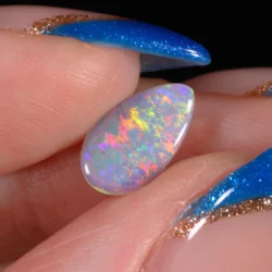 teardrop-dark-crystal-opal-finger-display-0-64ct-opal-galaxy