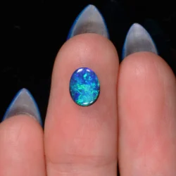 vivid-cyan-blue-green-fire-black-opal-0-63ct-opal-galaxy