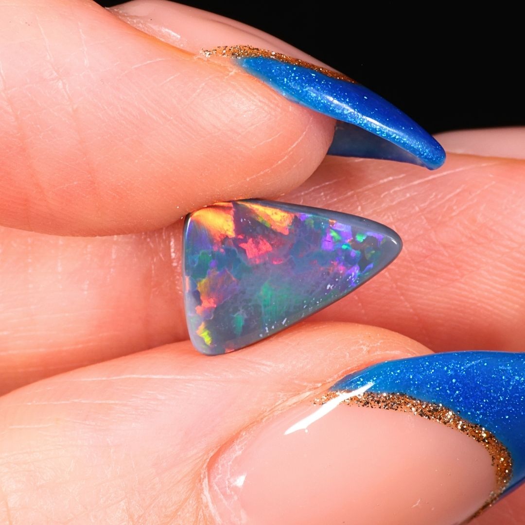 Black Opal Lightning Ridge 0.89ct Hand Shot