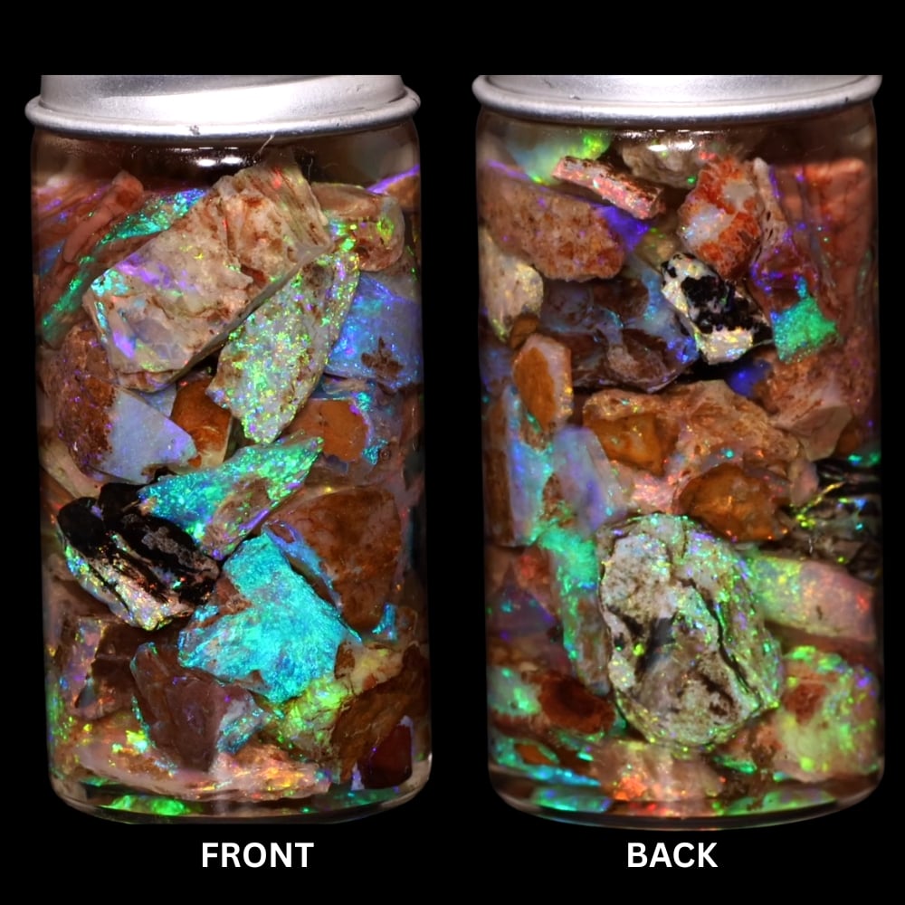 Gem quality pipe Crystal Boulder Opal chips showing vivid aqua blue and green play of color under LED lighting