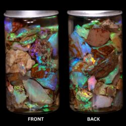 Australian Crystal Boulder Opal chips in jar from Quilpie showing natural host material and soft multicolor crystal opal