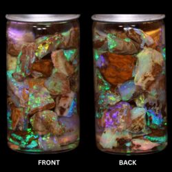 Australian Crystal Boulder Opal chips in jar from Quilpie showing natural host material and vivid multicolor crystal opal