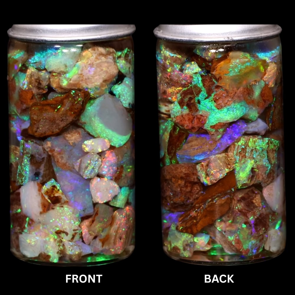Gem quality pipe Crystal Boulder Opal chips showing soft green pink and rainbow play of color under LED lighting
