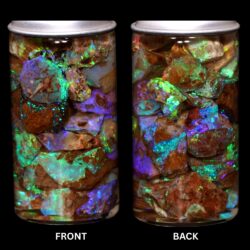 Gem quality pipe Crystal Boulder Opal chips showing vivid green purple blue and turquoise play of color under LED lighting