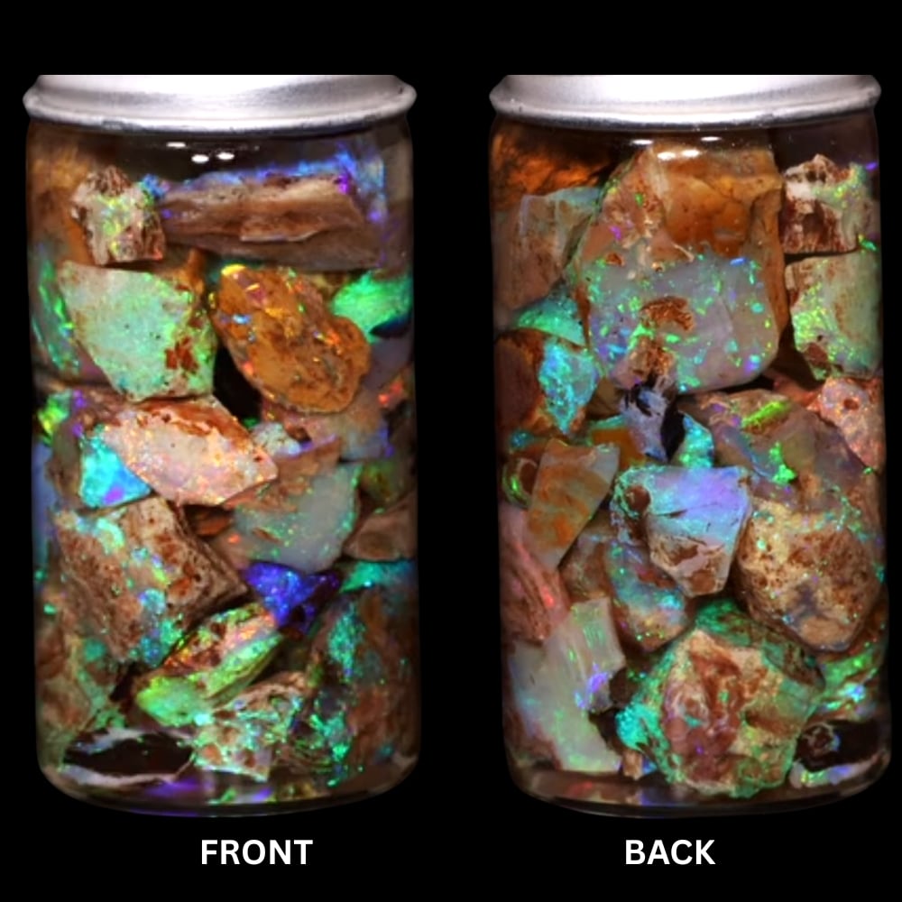Gem quality pipe Crystal Boulder Opal chips showing mint green blue and purple play of color under LED lighting