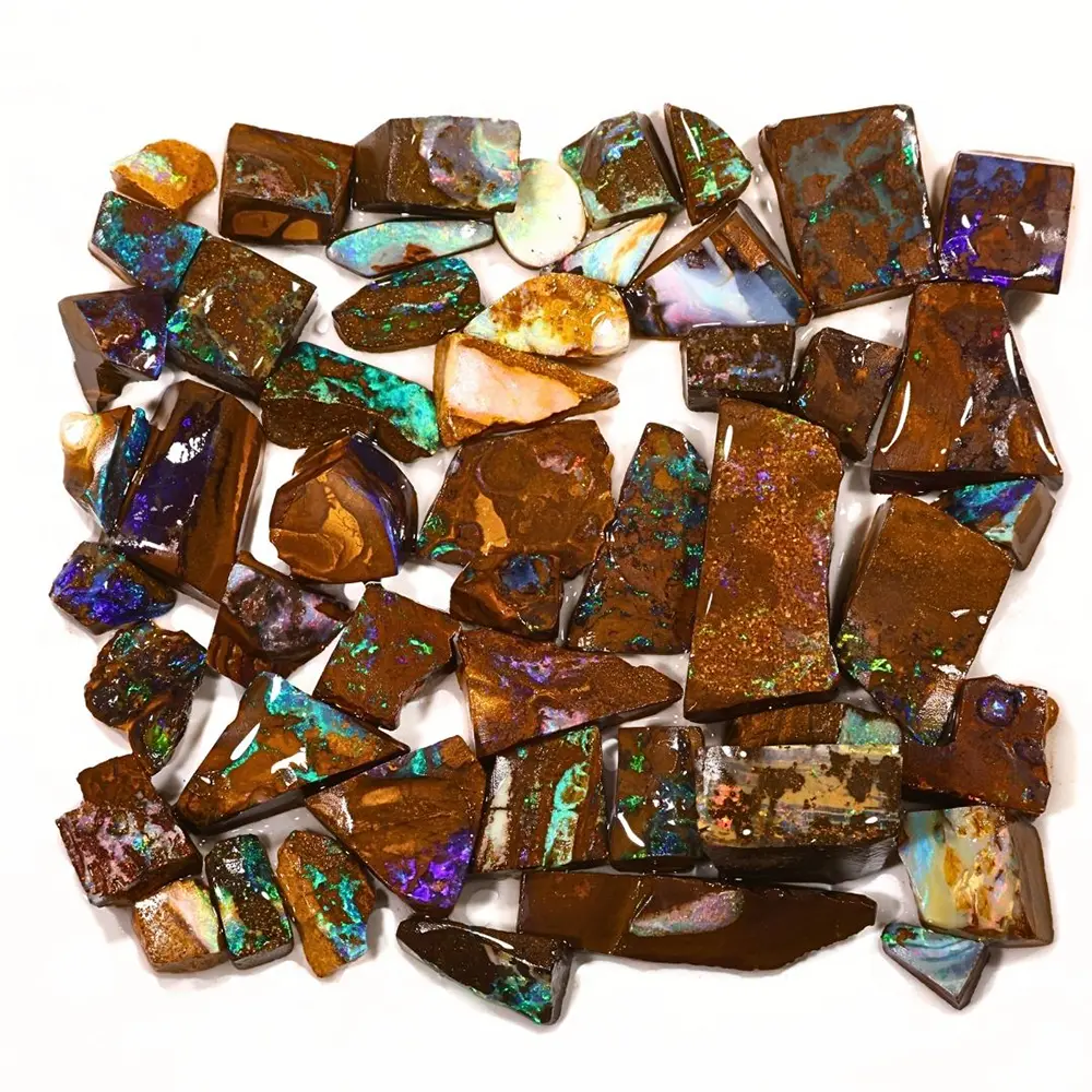 Full view of 50 Winton Boulder Opal rubs showing blue green purple and multicolor opal in natural brown ironstone matrix
